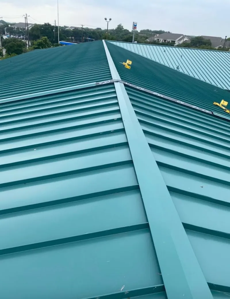Green commercial metal roof ridge and valley for Metal Roof Repair in Point Pleasant